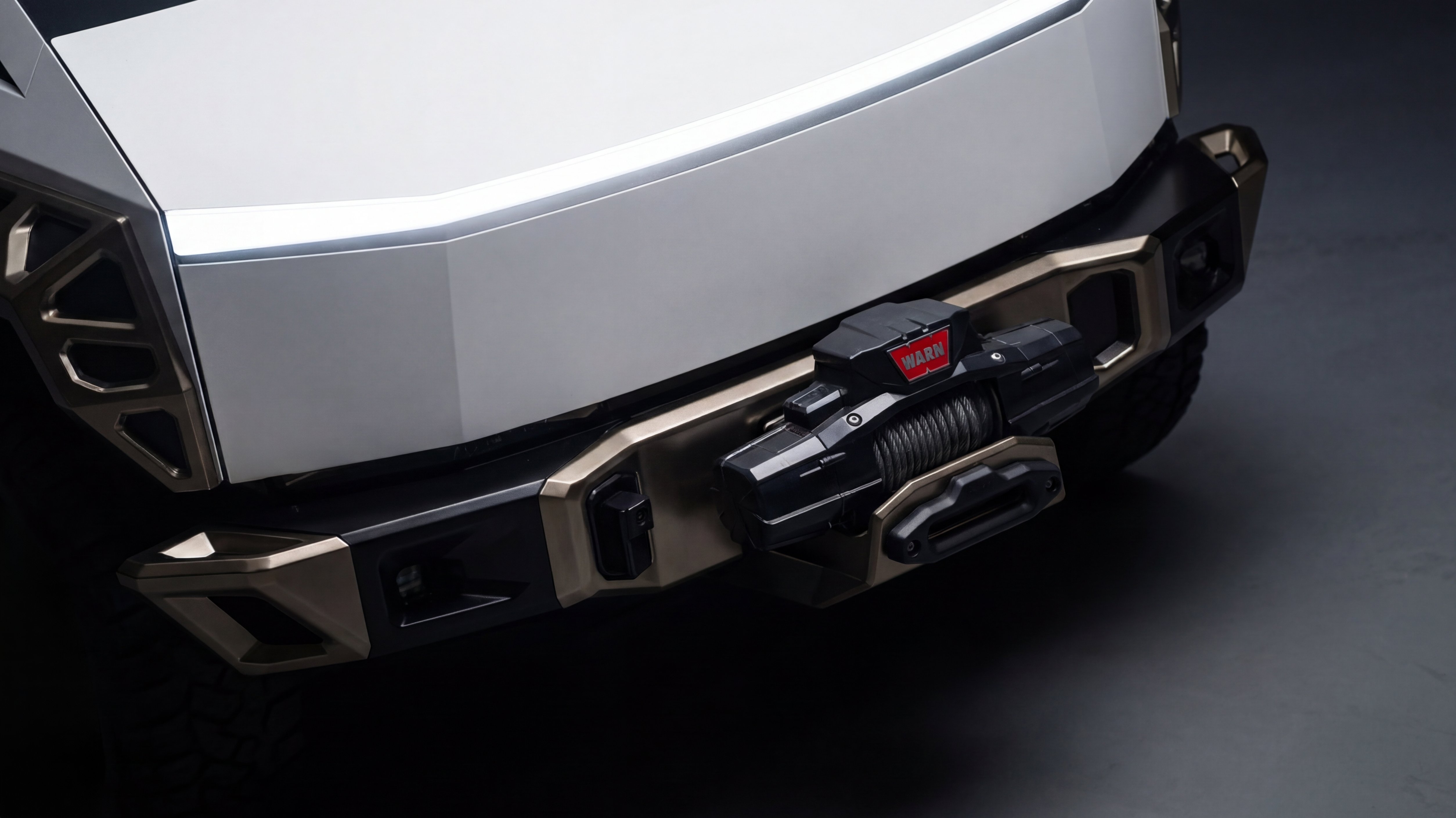 Xolaris front detail — WARN winch integrated with aluminum bumper